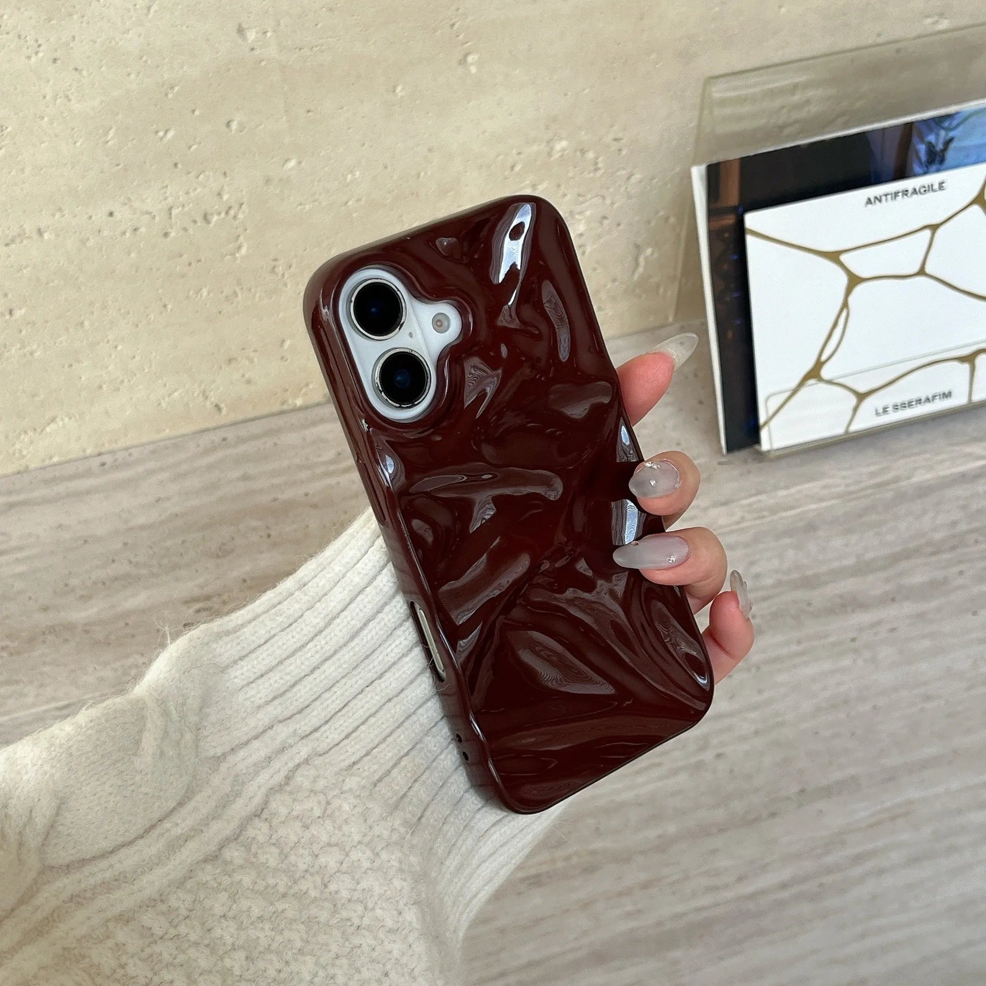 Niche irregular pleated three-dimensional TPU phone case in wine red for iPhone