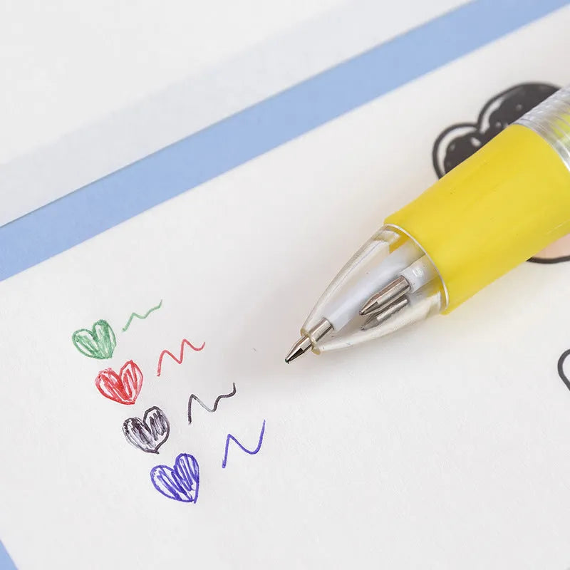 A four-colour press ballpoint pen with a cute cartoon design, showing a bullet-shaped 0.7mm writing tip.