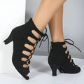 Women's lace-up Latin dance shoes in black with synthetic leather upper and leather sole, side view