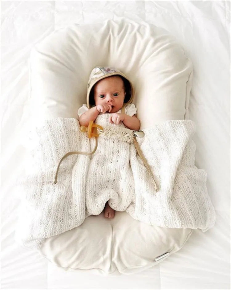 Portable baby nest crib with 75x45cm dimensions in cotton with PP filler