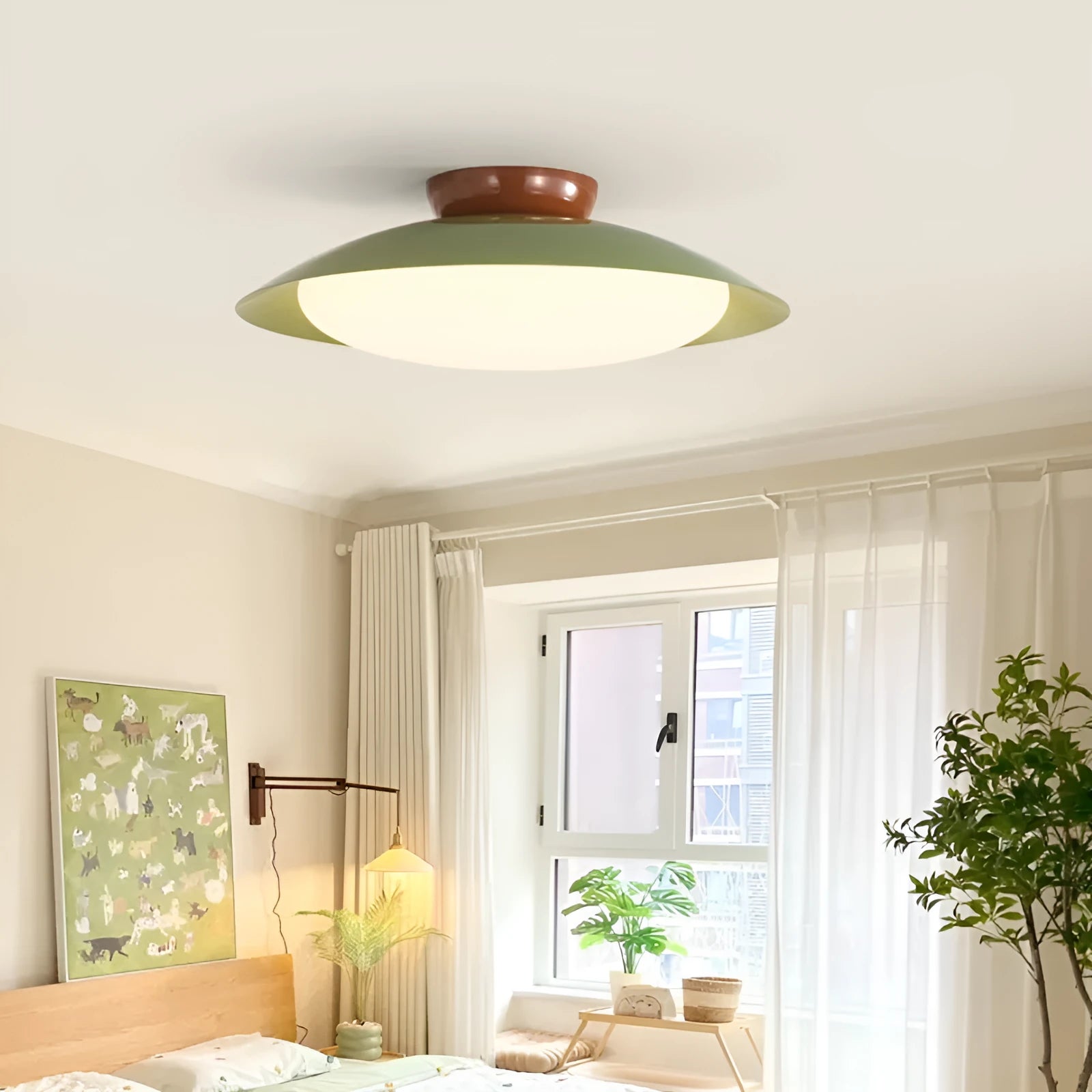 Modern flying saucer shaped ceiling lamp in cream style colours for bedroom