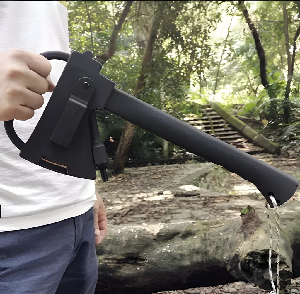 Black survival tactical axe with stainless steel blade and K sheath on outdoor rocky surface