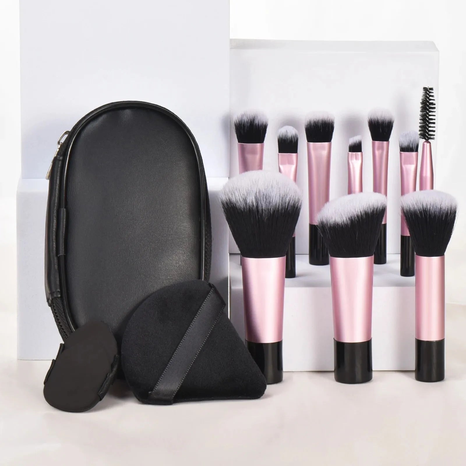 Mini makeup brush set with storage bag, artificial fibre and goat hair bristles, long handle, and air cushion puff