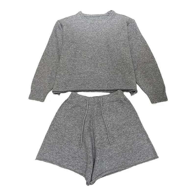 Women's loose-fitting long sleeve sweater and wide-leg shorts two-piece set in a neutral colour.