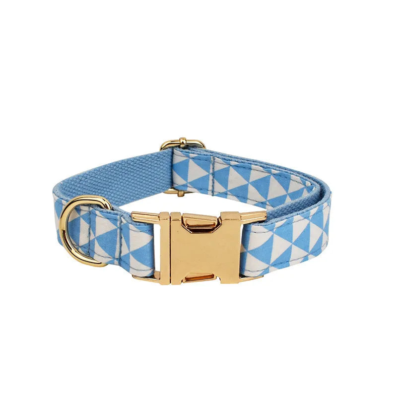 Blue cloth dog collar, leash, bow, and vest four-piece pet accessory set with triangular ring rope design.