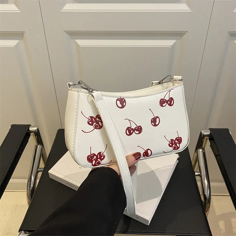 Casual PU underarm crossbody bag with floral print in black colour showing three-dimensional outer pocket