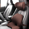 Memory foam car seat waist cushion and lumbar support pad with removable polyester cover.