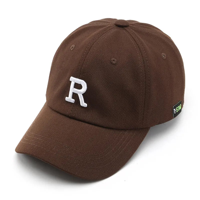 Adjustable unisex baseball cap with embroidered letter R in black cotton satin weave with brim