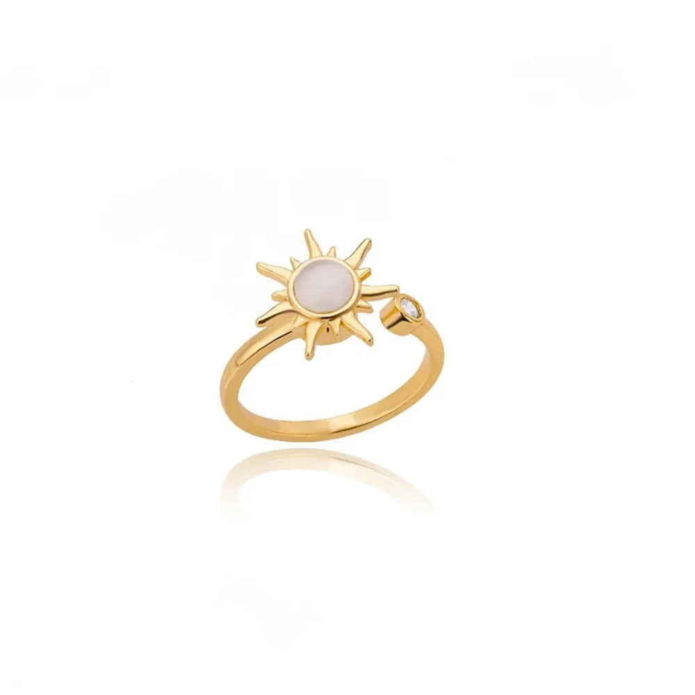 Gold electroplated copper rotatable decompression ring with geometric design and adjustable opening