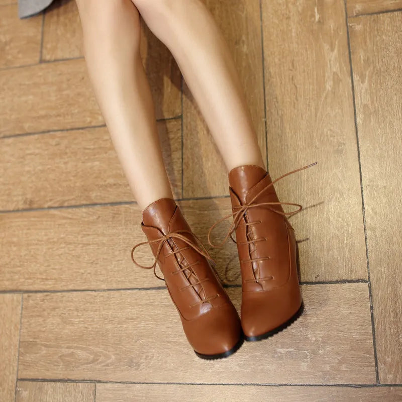 Women's lace-up Martin boots with stiletto heel in black, brown, and red