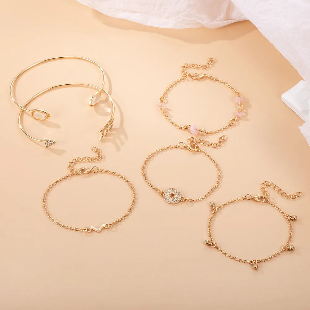 Six-piece women's fashion bracelet set with golden spot drill and water droplet designs