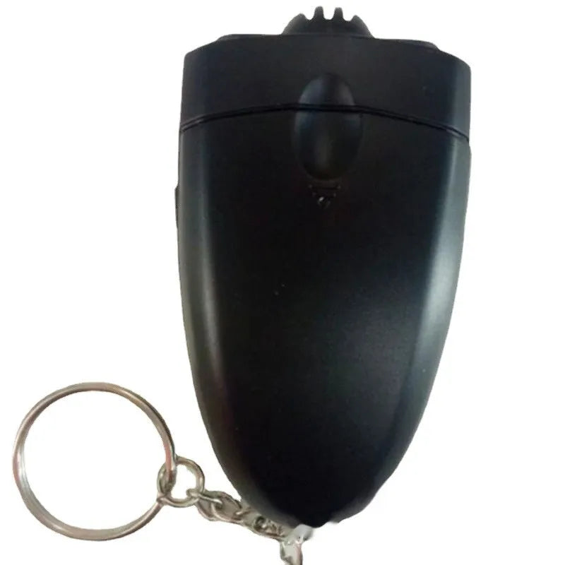 Black portable breath alcohol tester with LED display, torch flashlight, and keychain attachment on a white background