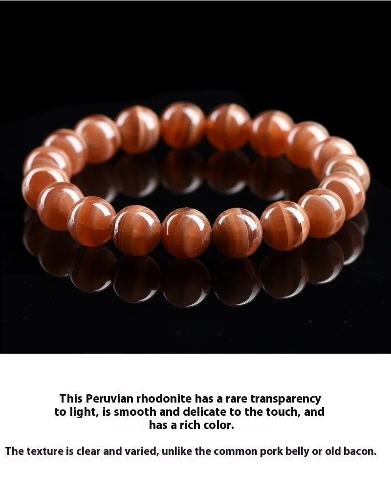 Peruvian rhodochrosite bracelet with geometric round beads in traditional ruyi design