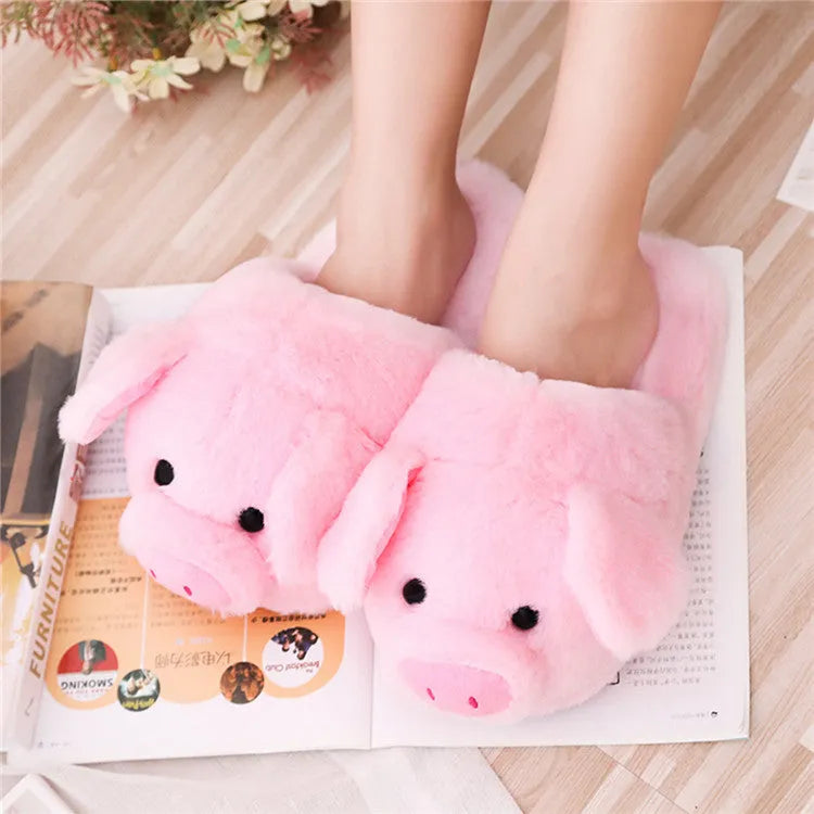 Pink pig floor slippers with short plush fabric and PP cotton filling.