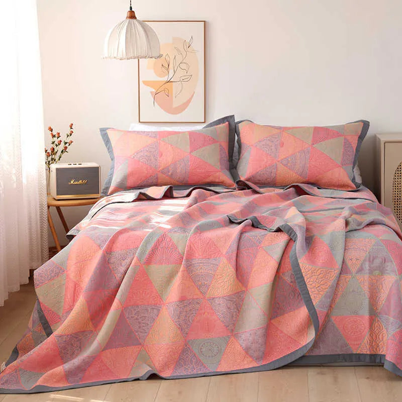 Cotton gauze three-piece blanket set with floral pattern and matching pillowcases for bed