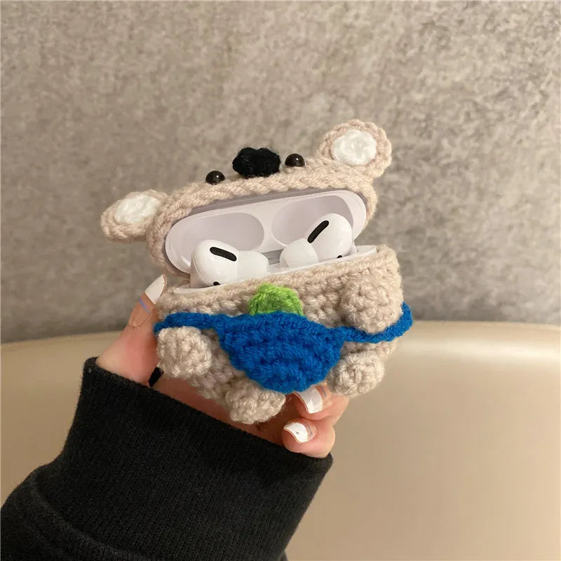 Handmade knitted AirPods protective cover with backpack koala bear design showing front and side views