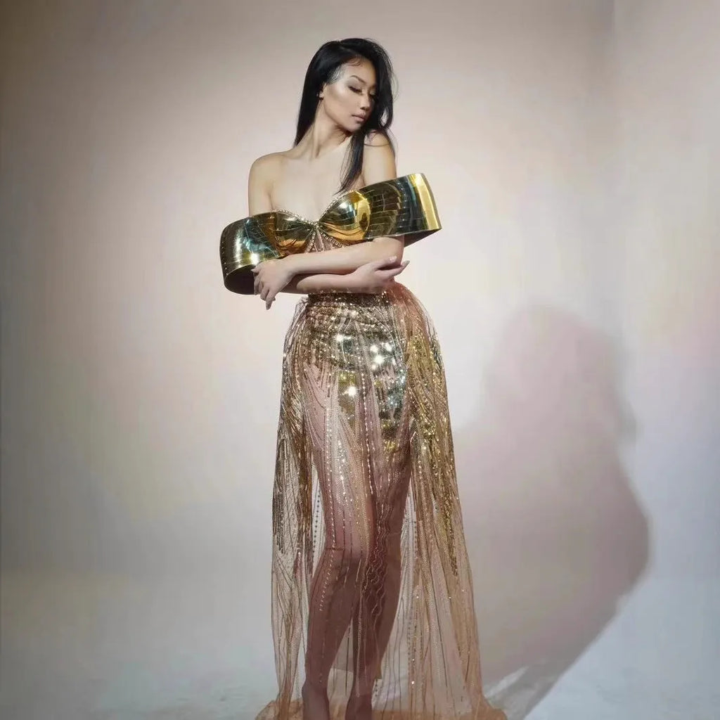 Gold strapless sequined dress with thigh-high split and tulle overlay, formal women's gown