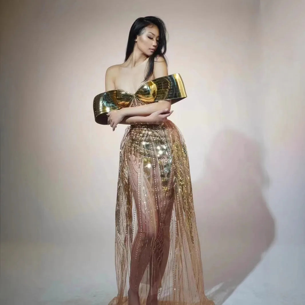 Gold strapless sequined dress with thigh-high split and tulle overlay, formal women's gown
