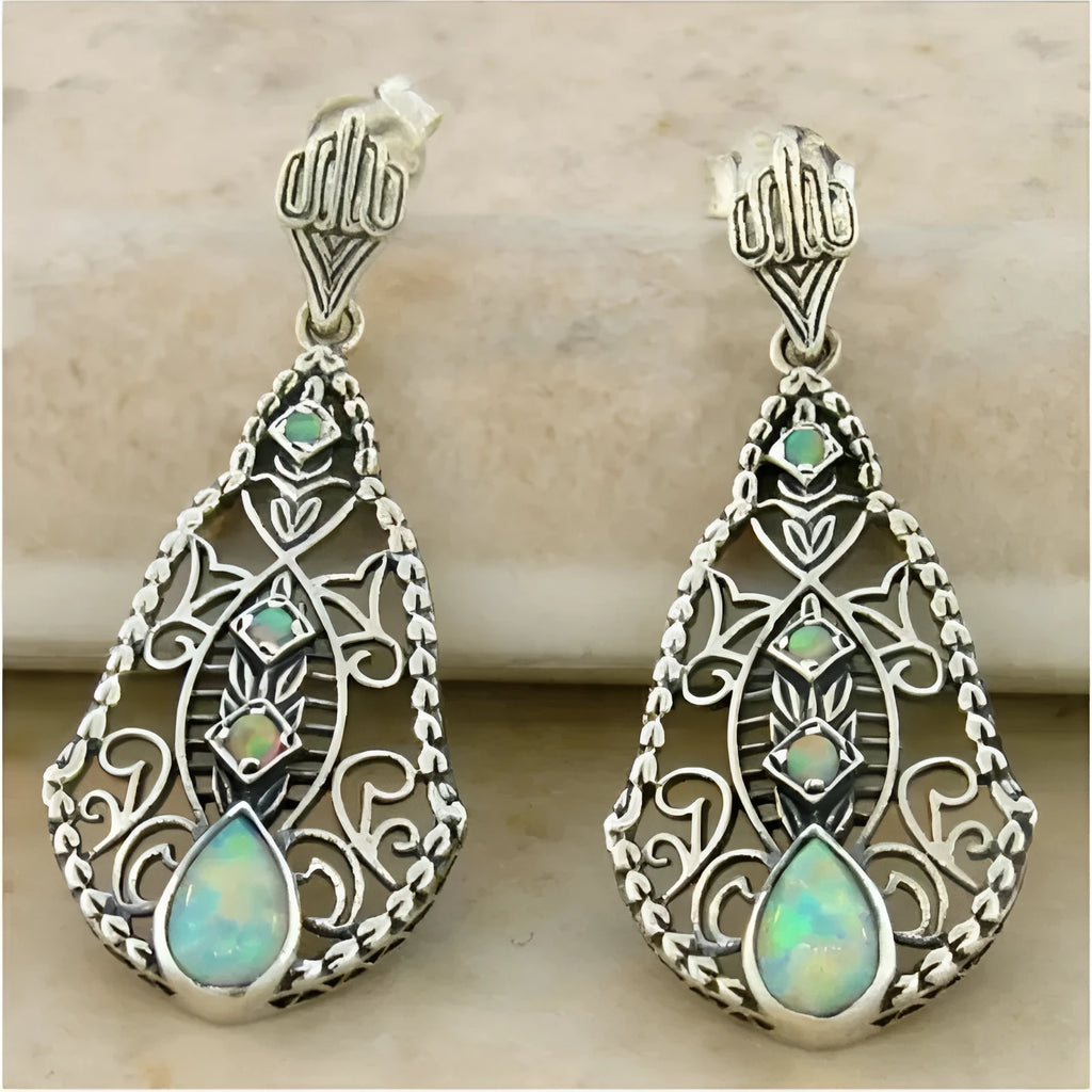 Women's antique silver alloy earrings with retro snake motif, 5 cm length, suitable for pierced ears