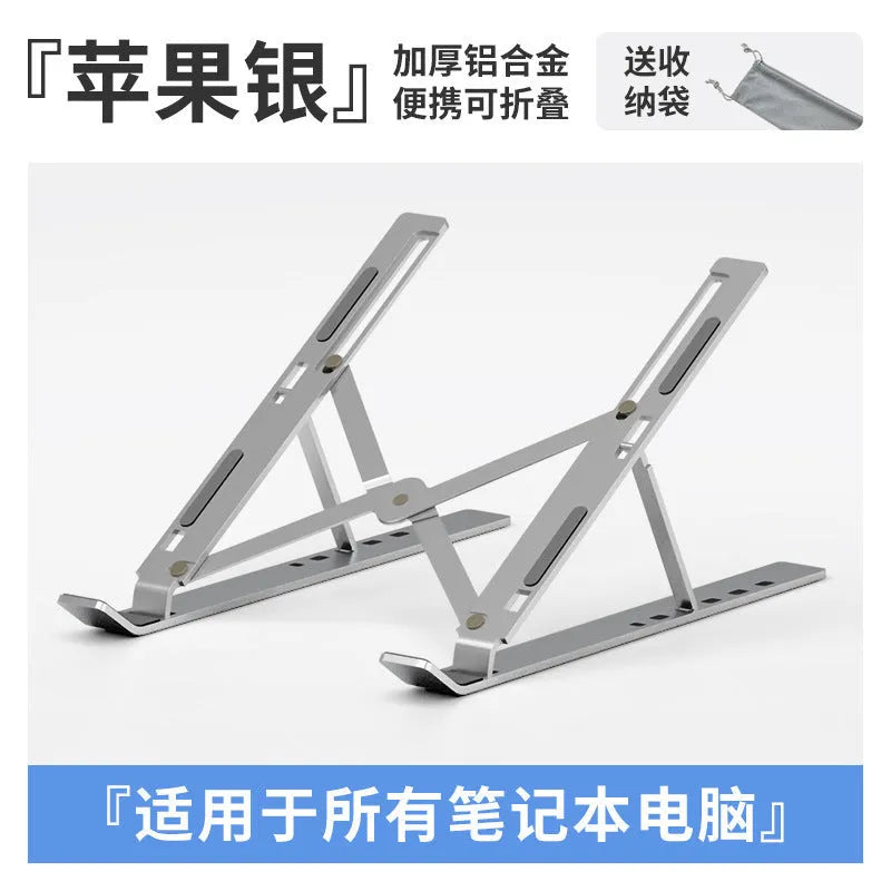Silver aluminum folding laptop stand open on a desk with a laptop.