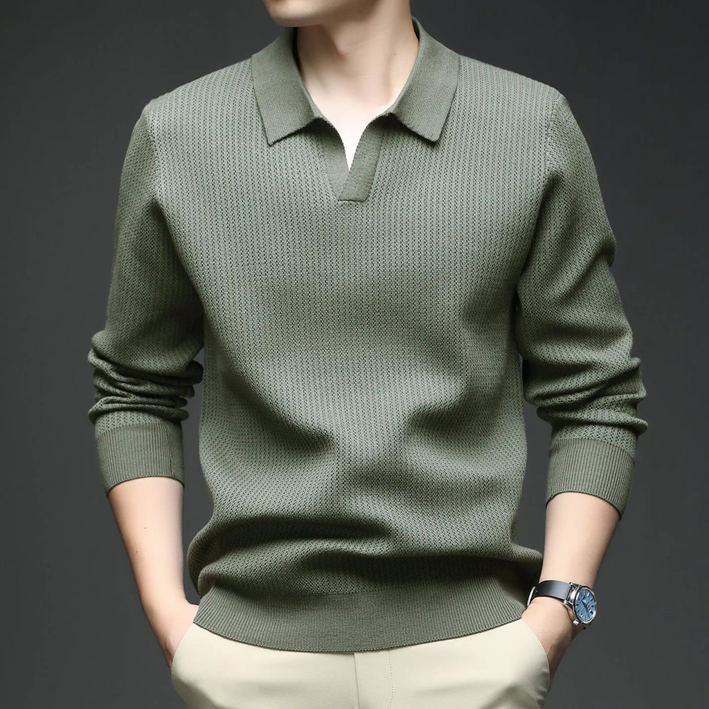 Men's loose fit long sleeve pullover sweater in green, shown flat.