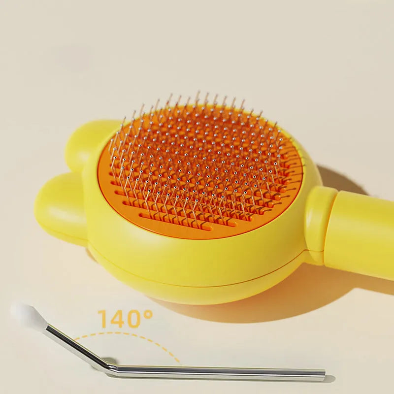 Green self-cleaning pet grooming brush with stainless steel teeth and rubber tips