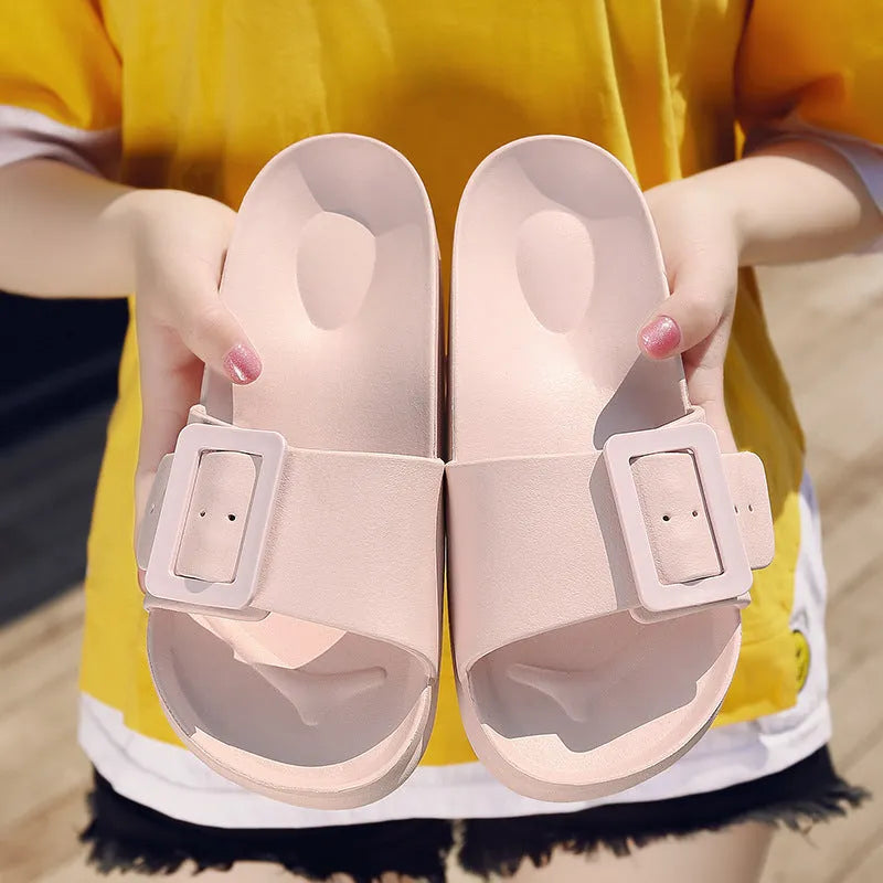 Women's grey blue flip-flop slippers with adjustable buckle strap and textured EVA sole