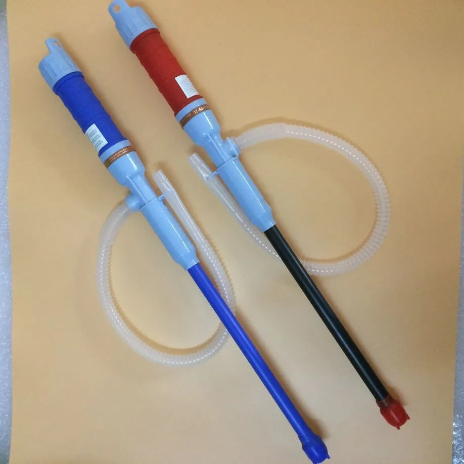 Manual hand-operated siphon pump for fuel transfer in blue or red colour