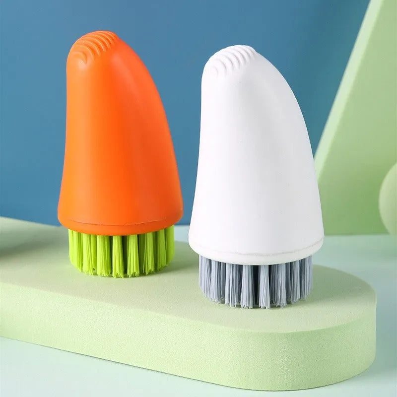Orange and white carrot-shaped nylon vegetable cleaning brush for scrubbing potatoes