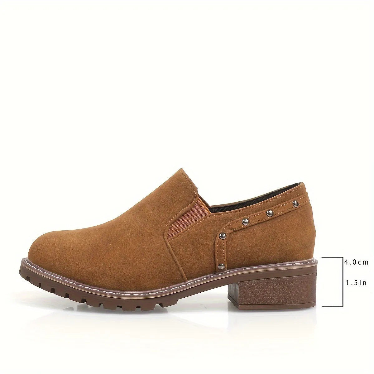 Women's light brown suede ankle boots with a low thick heel and elastic band fastening.