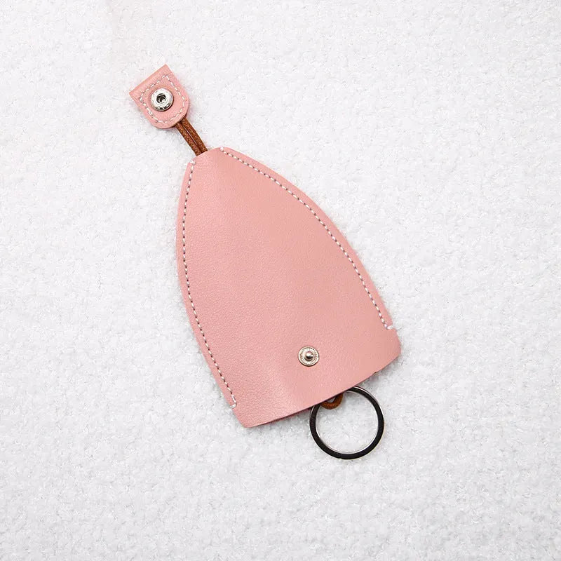 Cartoon design pull-out key case for car keys in PU leather.