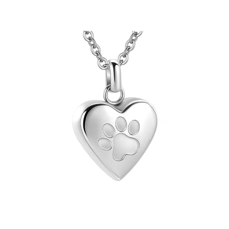 Titanium steel heart pendant necklace with paw print design and openable casket feature.