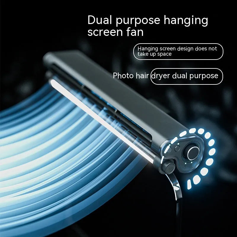 Black USB-powered bladeless fan with clip mount attached to laptop screen showing integrated lighting