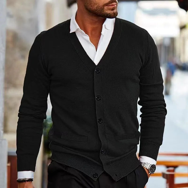Men's slim fit acrylic cardigan in light grey shown on a model, featuring long sleeves and a button front.