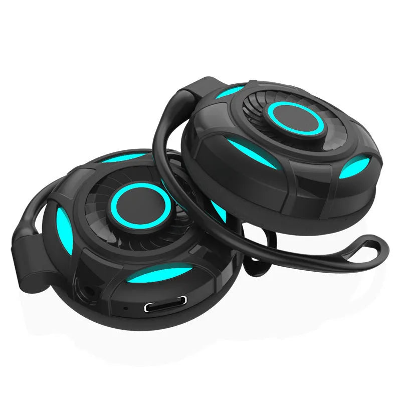 Black Bluetooth gaming earphones with hanging ear design and USB charging cable