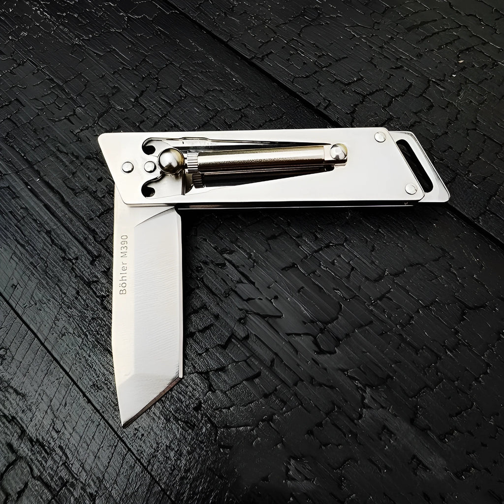 Heavy-duty folding stainless steel utility knife with neutral finish, closed position