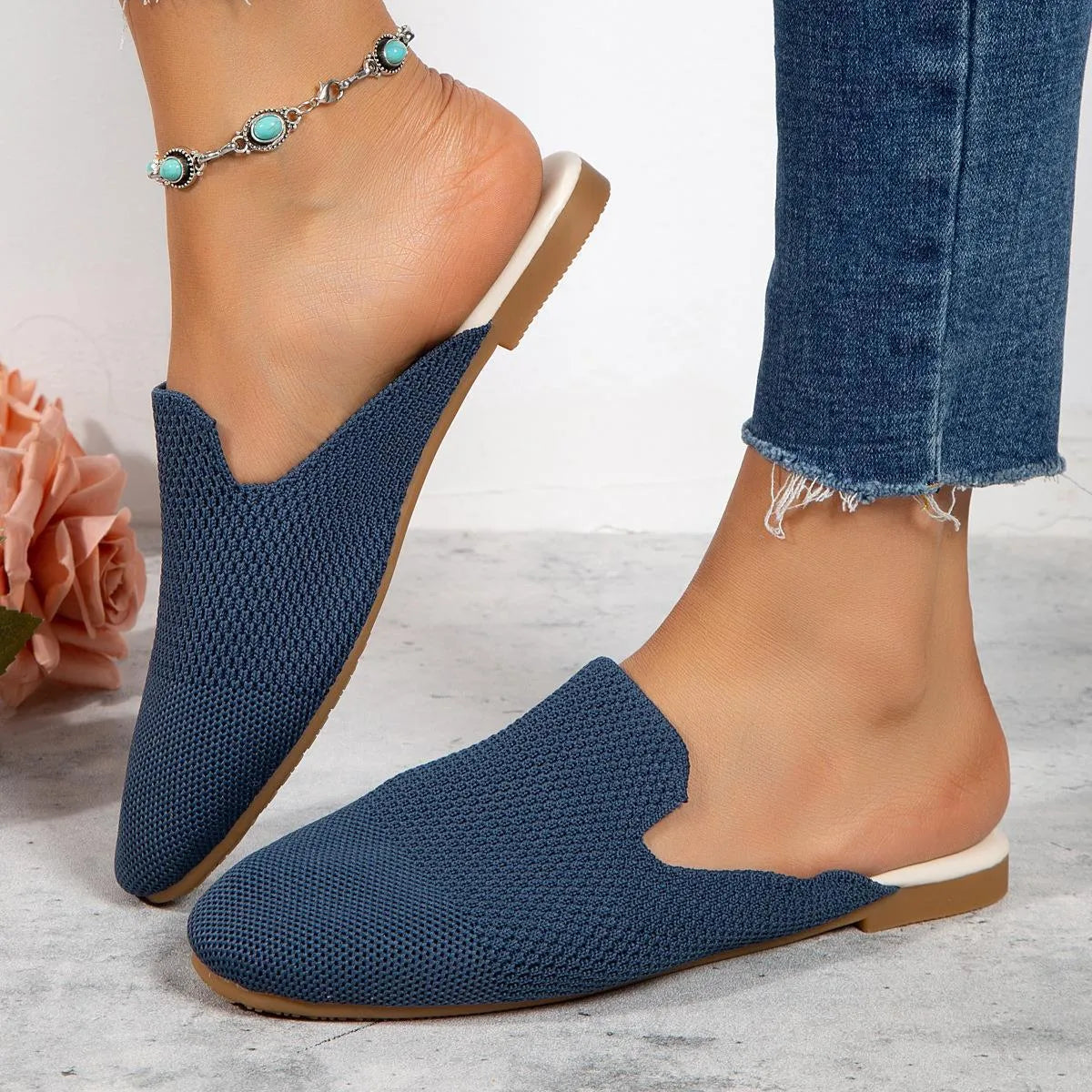 Mesh slip-on sandals in apricot, blue, and green with a cloth upper and flat rubber sole.