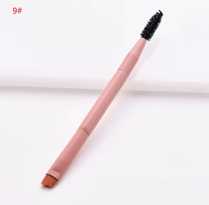 Ten cosmetic makeup brushes with wooden handles arranged showing various brush head shapes and sizes