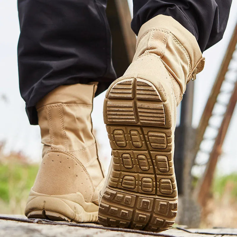 Yulong summer tactical desert combat boots in black and sand colour, shown on a rocky outdoor surface.