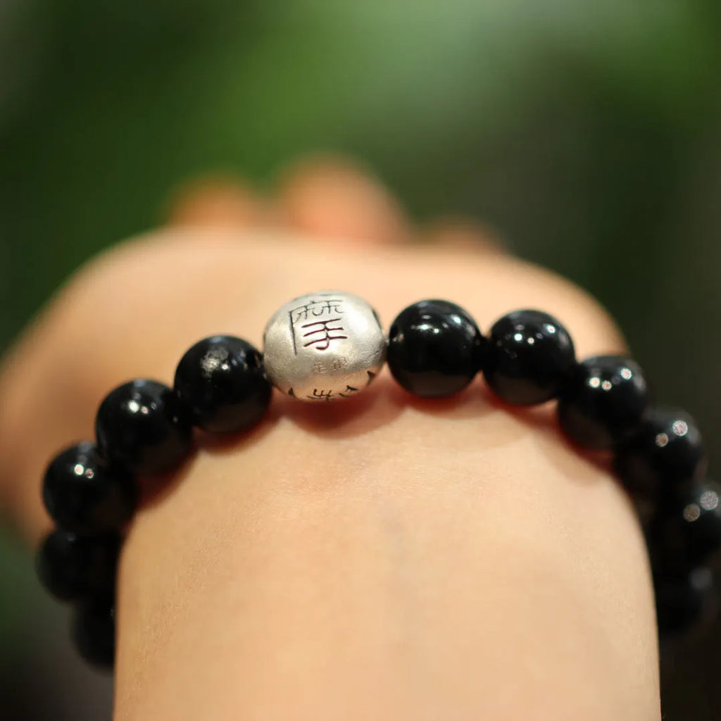 Black agate and sterling silver bracelet with 10mm beads in Chinese style design