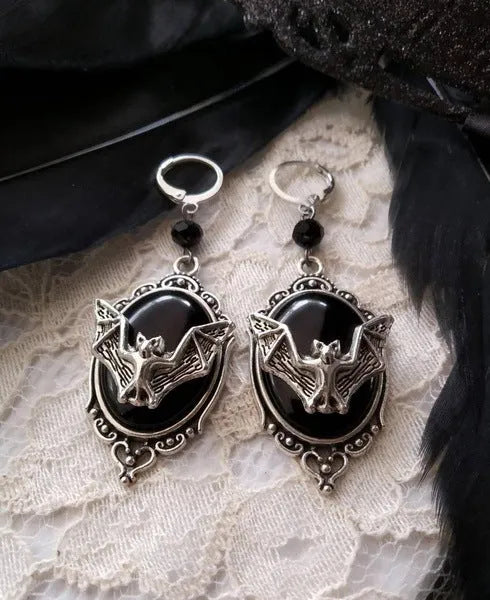 Black alloy Halloween bat earrings with electroplated finish and inlaid gems, unisex style