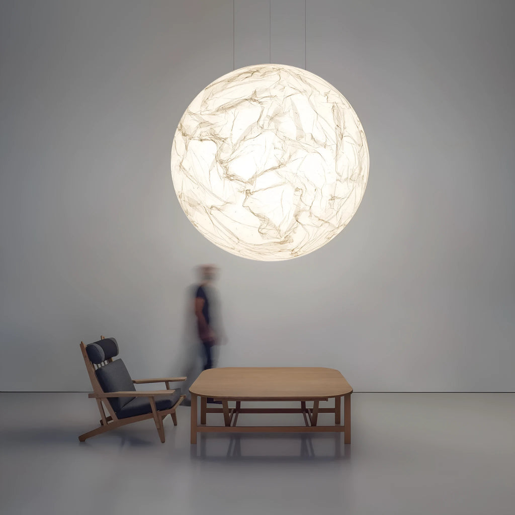 Moon pendant light in a double-height restaurant or living room – D40 or D50 size – low-voltage 36V – light luxury style