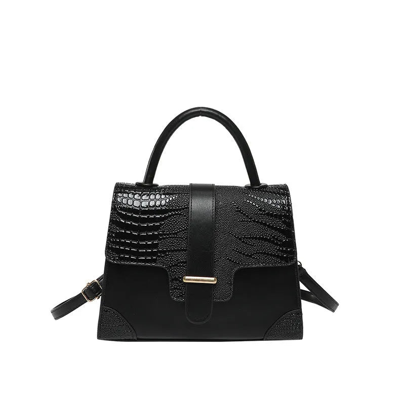 Ladies PU crossbody bag in black with single strap and medium-hardness shape
