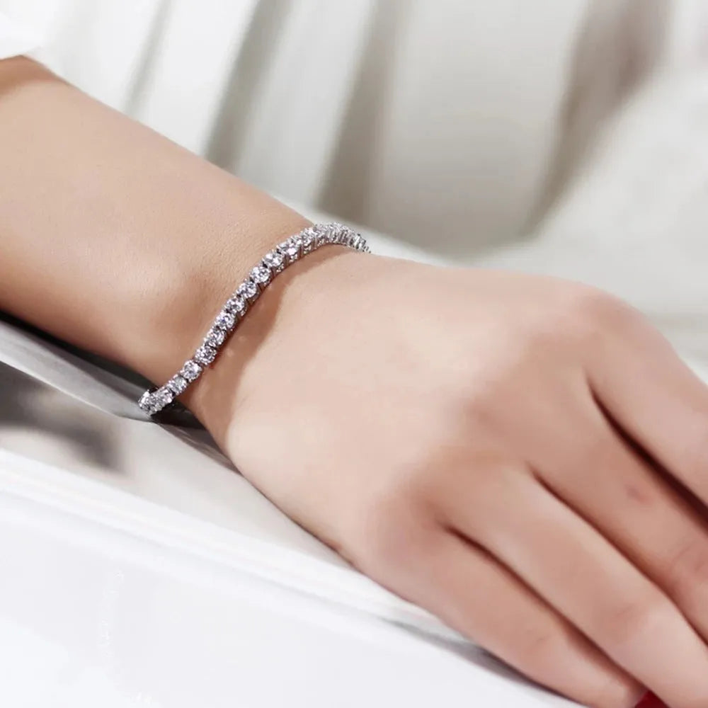 S925 silver bracelet with micro inlay floral leaf chain design on neutral background