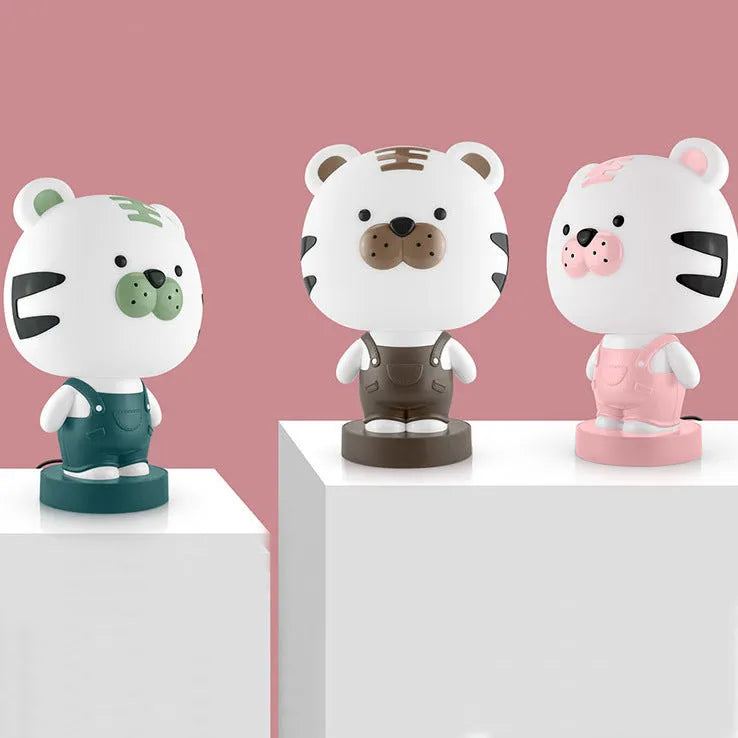Cartoon animal table lamp in Bear, Cattle, Rabbit or Tiger design with LED light and plastic shade.