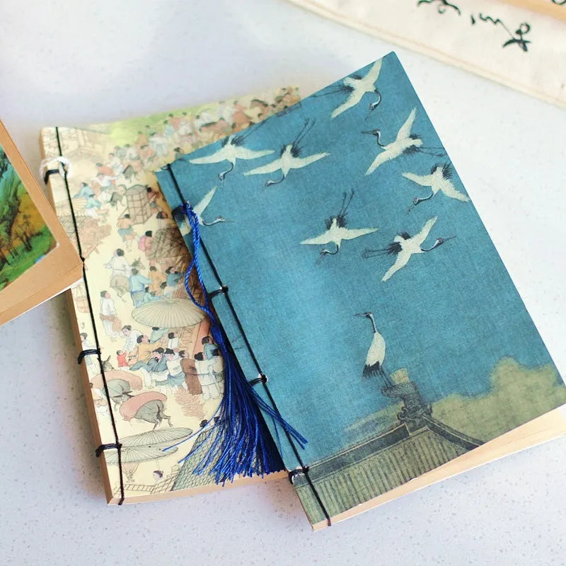 A5 antique thread-bound notebook with embossed cover and decorative tassels