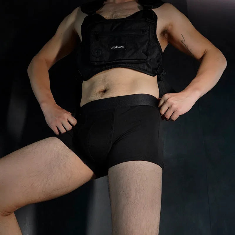 Men's solid colour cotton boxer underwear shown in available colours with elastic waistband