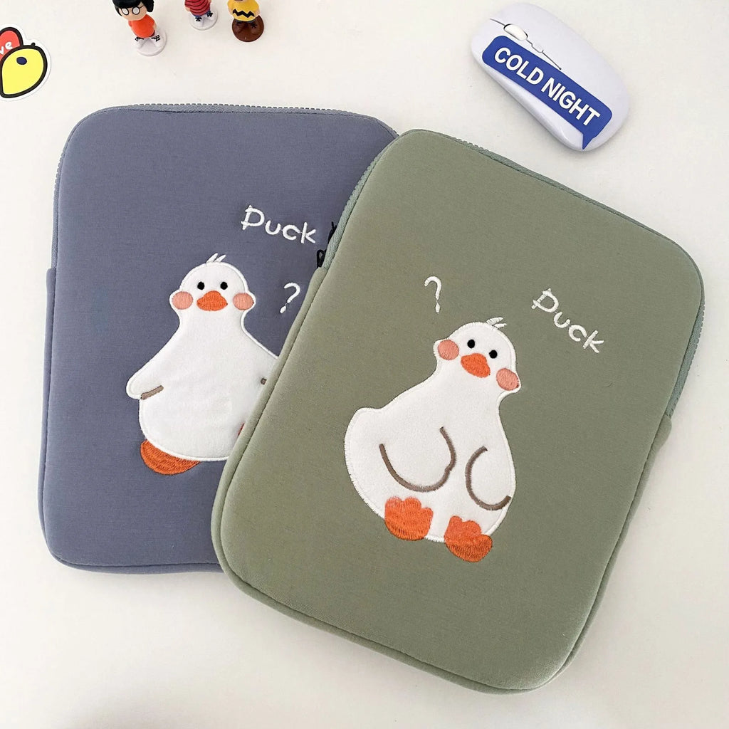 Blue cotton tablet case with embroidered cartoon duck design and zip closure