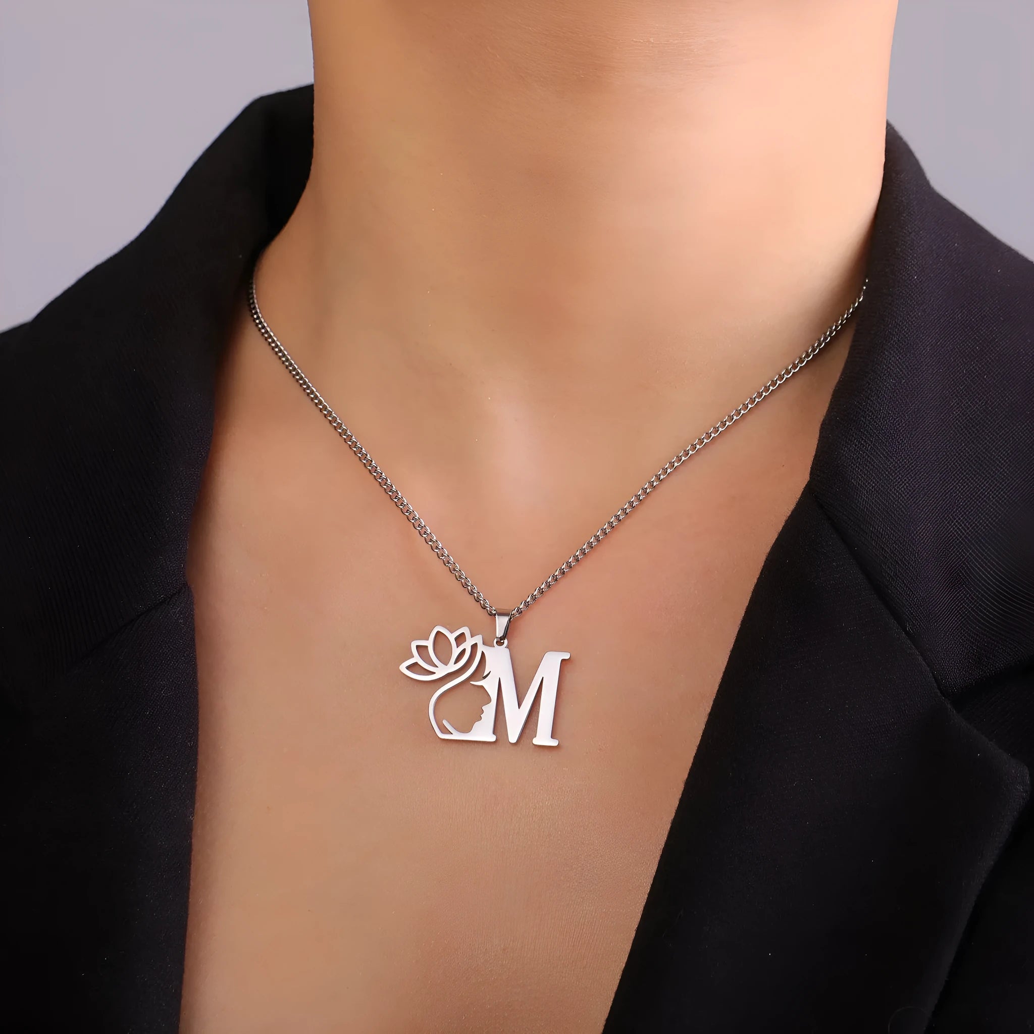 Stainless steel letter necklace with cross chain design and single pendant in gold or silver electroplated finish