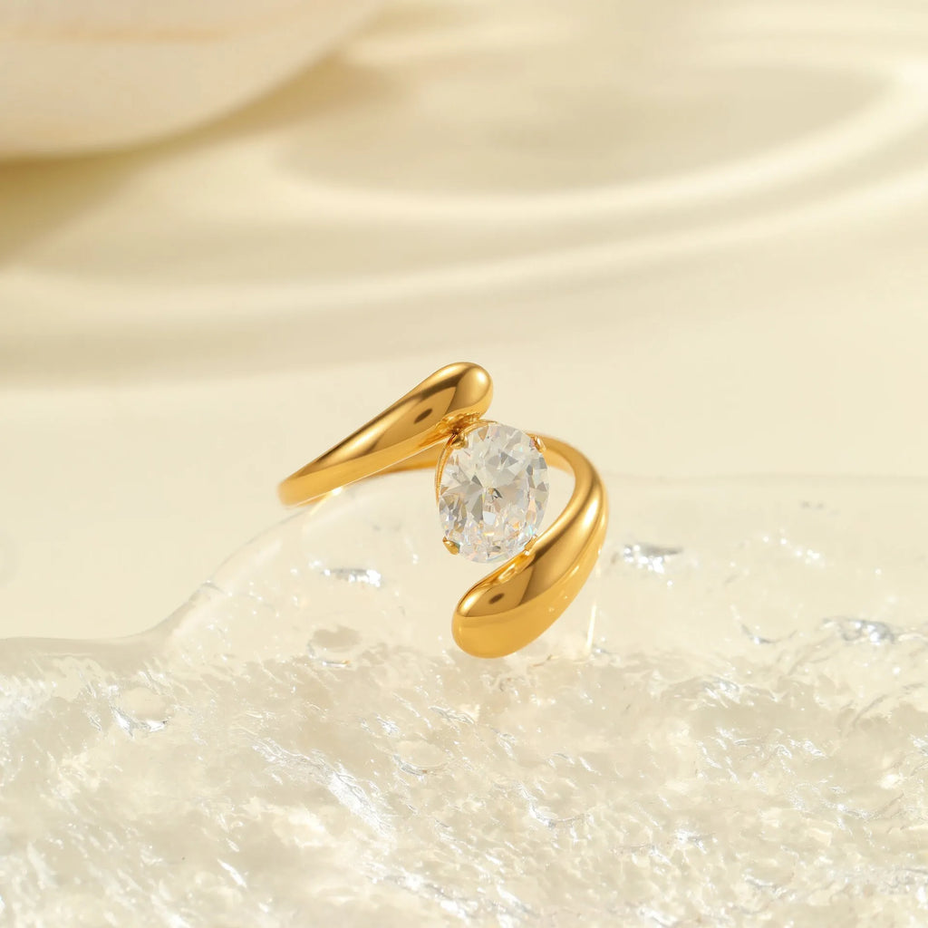 Women's stainless steel geometric zircon ring with open mouth design on a hand.